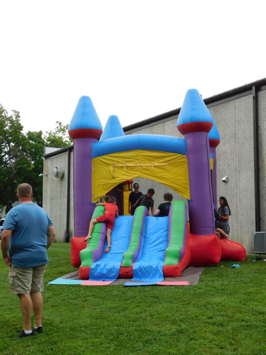 Kids Playing on Inflatable Slide